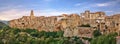 Pitigliano, Grosseto, Tuscany, Italy: landscape at dawn of the picturesque medieval town founded in Etruscan time on the tuff hill Royalty Free Stock Photo