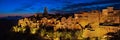 Pitigliano, Grosseto, Tuscany, Italy: landscape at dusk of the m Royalty Free Stock Photo