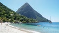 The Piton mountains Gros Piton and Petit Piton in a lush green forest next to the blue ocean on Saint Lucia Island in the Caribbea Royalty Free Stock Photo