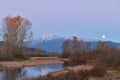 Pitt River and Golden Ears Mountain at sunset and moonrise