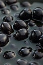 Pitted black olives. Marinated olives in the pickle Royalty Free Stock Photo