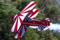 Pitts S-1T aerobatic biplane VH-EXO flying at low level during an aerobatics routine