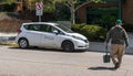 Pittsburgh, Pennsylvania, USA April 27, 2023 A Bio Test Express employee with a pick up, walking to his company car