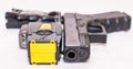Pittsburgh, Pennsylvania, USA April 13, 2021 A black Glock 9mm pistol with a X26 Taser gun Royalty Free Stock Photo