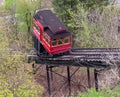 Pittsburgh, Pennsylvania, USA April 11, 2021 A cable car on the Duquesne Incline traveling up its rails to the Mt Washington stati