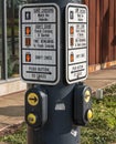 Pittsburgh, Pennsylvania, USA December 8, 2023 Crosswalk pedestrian sign and buttons on a pole on Penn Avenue Royalty Free Stock Photo