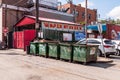 Pittsburgh, Pennsylvania, USA 8/23/20 Garbage dumpsters lined up in a parking lot behind a restaurant