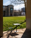 Pittsburgh, Pennsylvania, USA March 8, 2023 A metal table and chair under the School of Drama at Carnegie Mellon University campus