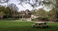 Pittsburgh, Pennsylvania, USA 04/18/2019 Mellon Park field with a picnic bench