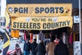 Pittsburgh, Pennsylvania, USA 12-13-20 People in front of a Pittsburgh sports apparel and memorabilia store on Penn Avenue