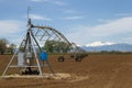 Pivot Irrigation System in a farming field with Longs Peak Mount Royalty Free Stock Photo