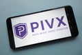 PIVX cryptocurrency logo displayed on smartphone