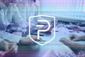 Pivx cryptocurrency sign. The concept of business, cryptocurrency and finance - a team of businessmen are sitting in an office at