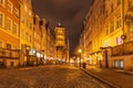Piwna street and view on the St Mary`s Basilica Tower in Gdansk, Poland, evening, no people