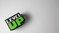 Pixel stile cube with the word level up in a white background copy space. Space for text