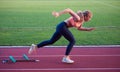 Pixelated design of woman sprinter leaving starting blocks Royalty Free Stock Photo