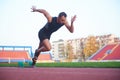 Pixelated design of woman sprinter leaving starting blocks Royalty Free Stock Photo