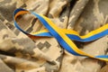 Pixeled digital military camouflage fabric with ribbon