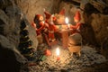 Pixie gang eating a Christmas meal in an underground den, only with light from the candles