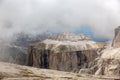 Piz Ciavazes on the Sella in the Dolomites with the Langkofel, Sassolungo in the Background. Clouds covering the Lang Kofel, Sasso Royalty Free Stock Photo