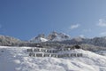 Piz tomuel or wissensteinhorn mountain and forest covered with snow seen from vals in switzerland