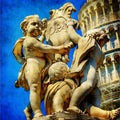 Piza tower and sculpture Royalty Free Stock Photo