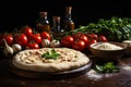 Pizza art, The process of making, Raw dough for pizza with ingredients and spices on table. Royalty Free Stock Photo
