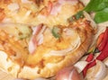 Pizza background in fast food close up with fresh paprika, garlic, shallots