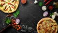 Pizza background. Set of delicious homemade pizzas. Royalty Free Stock Photo