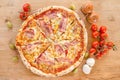 Pizza with bacon, pepperoni, melted cheese and mushrooms - Top view Royalty Free Stock Photo