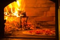 Pizza Baking In Wood Fired Oven