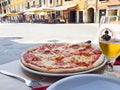 pizza, beer in cafe in the street