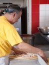 Pizza being assembled