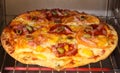 Pizza being cooked in oven