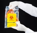 Pizza in biohazard plastic bag. Royalty Free Stock Photo