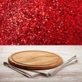 Pizza board, with napkin on wooden table. Top view mockup. Festive sparkling red background