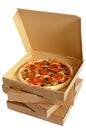 Pizza box open, pepperoni pizza inside, stack of delivery boxes isolated on a white background Royalty Free Stock Photo