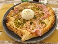Pizza buffalo mozzarella, pistachio mortadella Royalty Free Stock Photo