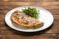 Pizza calzone with arugula and parmesan cheese Royalty Free Stock Photo