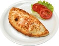 Pizza Calzone with salami bacon cheese and mushrooms Royalty Free Stock Photo