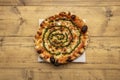 Pizza with caramelized onion with mozzarella cheese and pesto sauce Royalty Free Stock Photo