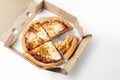 Pizza in a cardboard box on a white background. View from above. Space for text Royalty Free Stock Photo