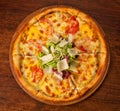 Pizza cezar on wooden table Royalty Free Stock Photo