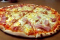 Pizza with cheese, creamy bacon sauce and ham.