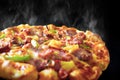 Pizza with cheese ham bacon and pepperoni on isolated black background with hot steaming smoke. Food and cooking concept. Lunch