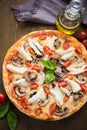 Pizza with chicken, tomato and mushrooms Royalty Free Stock Photo