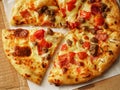 Pizza, close up photo of a delicious pizza with mozzarella cheese, onions, meat, tomato. Royalty Free Stock Photo