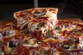 Pizza close up with slice lifted out with a lot of melting cheese Royalty Free Stock Photo