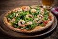 Pizza covered with roquette and shrimps Royalty Free Stock Photo