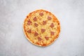 Pizza decorated with pepperoni shaped as Christmas trees Royalty Free Stock Photo